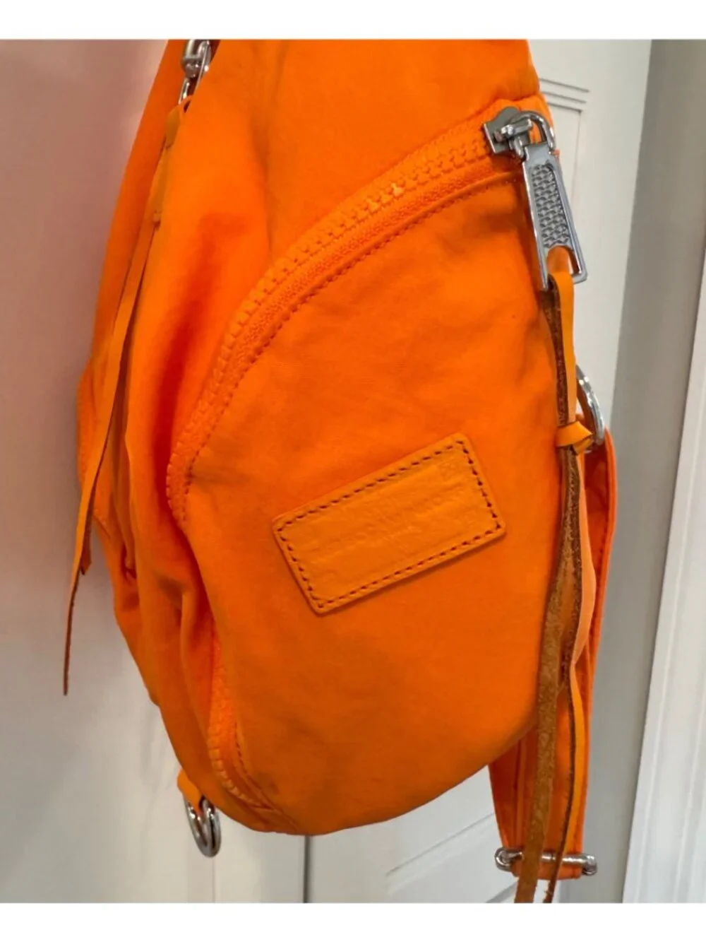 Rebecca Minkoff Orange Julian Nylon Backpack Purse with Fringe Pulls